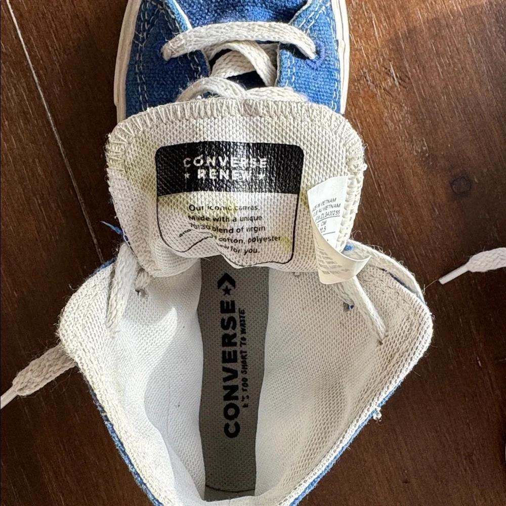 Size 2 Converse Chuck Taylor All Star Sneakers on blue